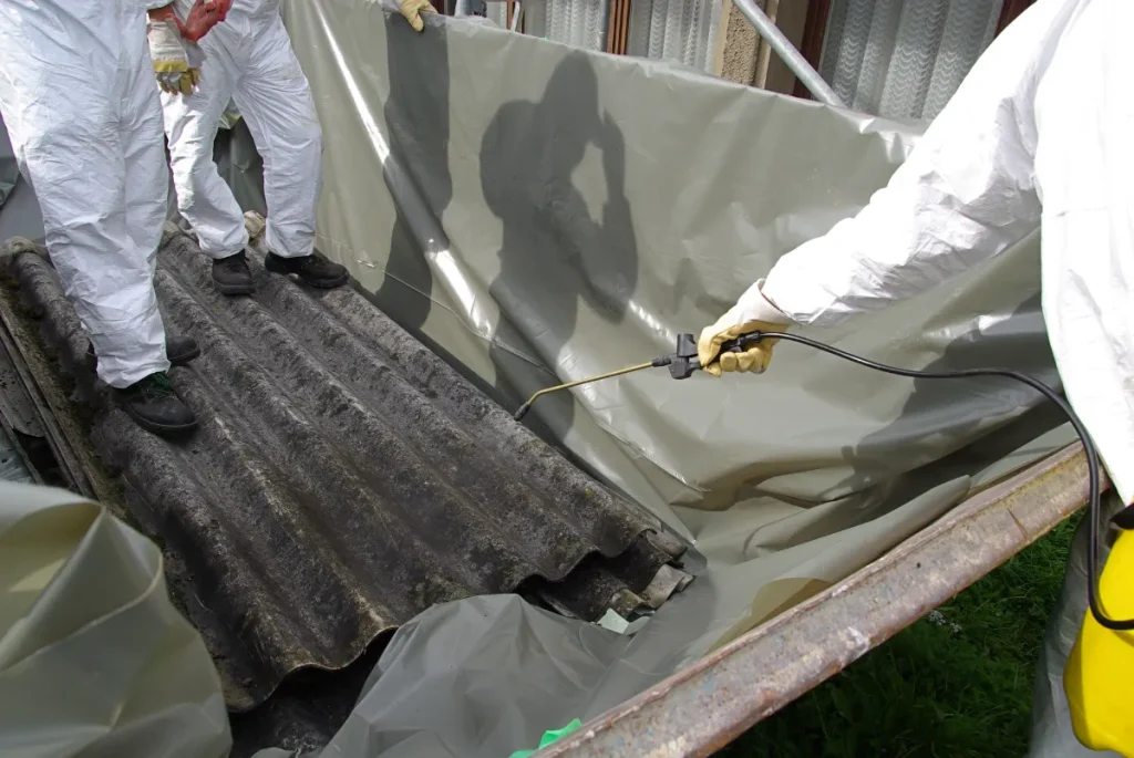 a-man-checks-the-corrugated-wall-whether-it-contains-asbestos-or-not