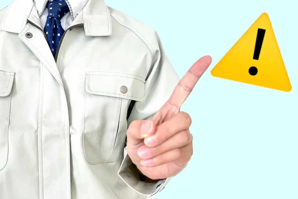 A-male-staff- member-offering-a-warning-about-deconstruction-of-the-building-containing-asbestos